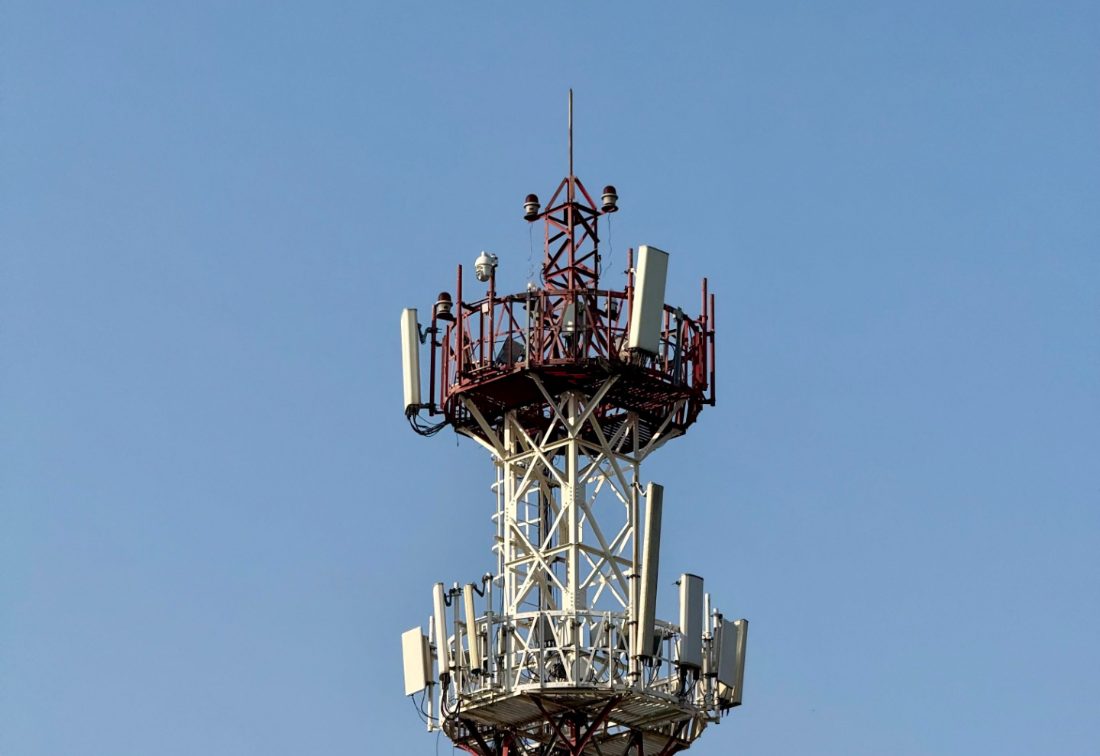 Self-supported communication tower with sector antennas