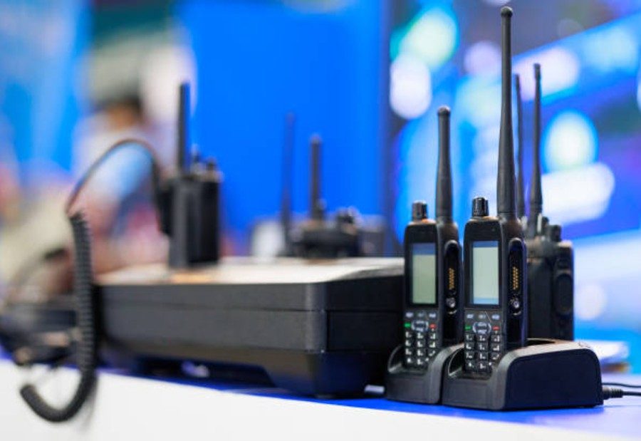 Digital handheld radios in a charging dock